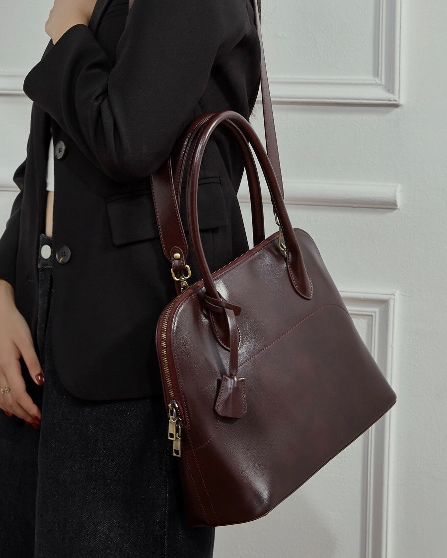 Women's Genuine Leather Dome Satchel with Signature Tassel