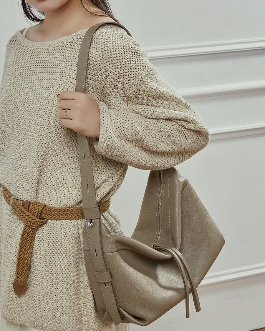 Women's Genuine Pebbled Leather Crescent Bag with Tassel Accent