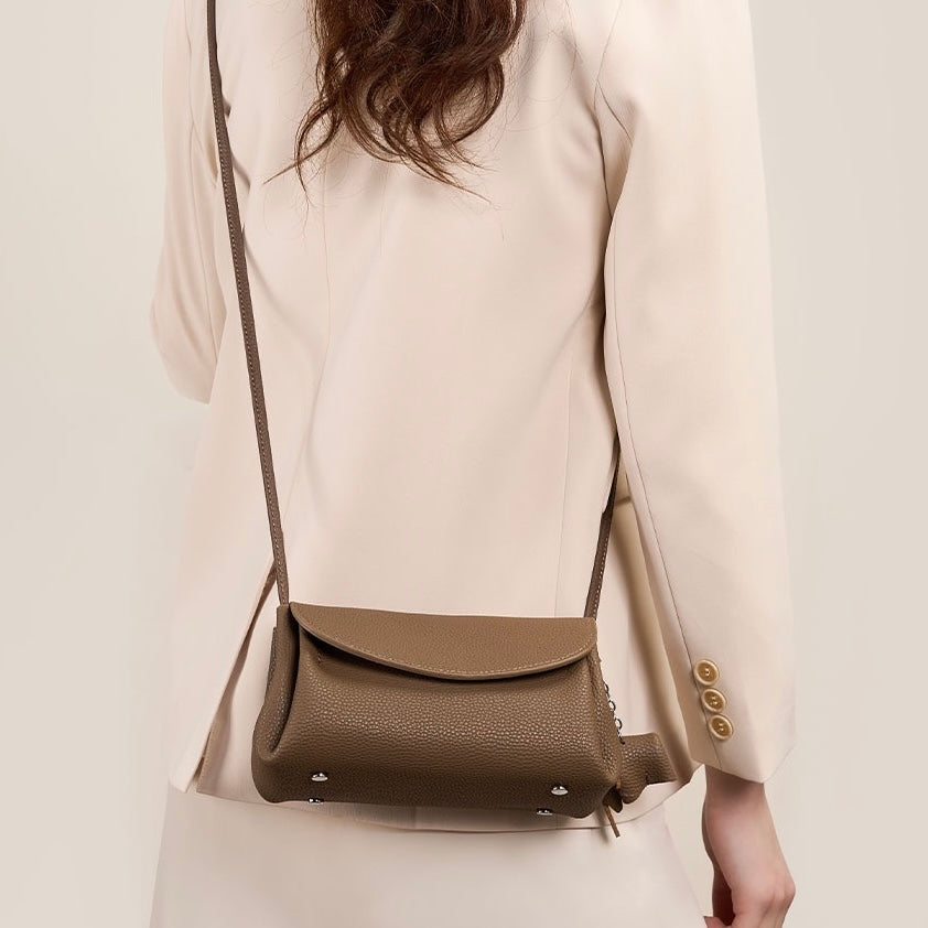 Exquisite Genuine Leather Crossbody Bag with Mini Elephant Pendant