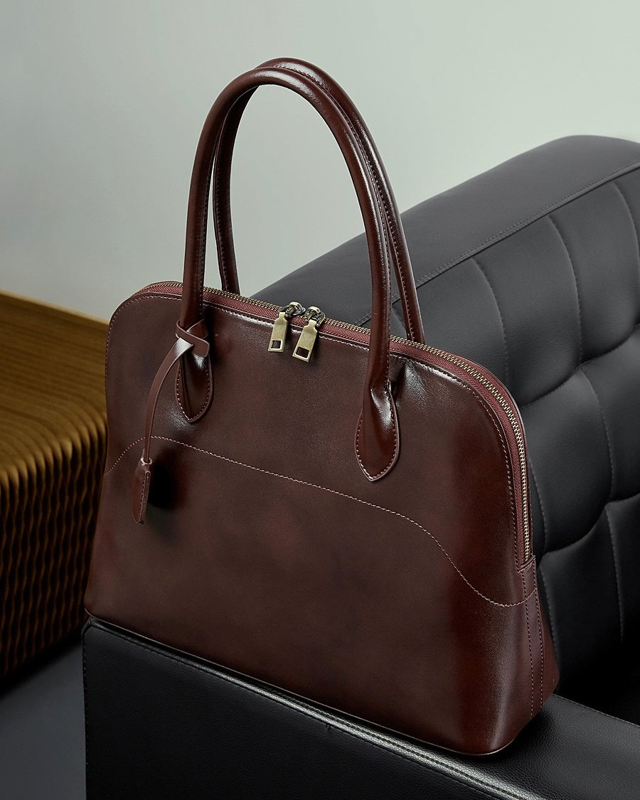 Women's Genuine Leather Dome Satchel with Signature Tassel