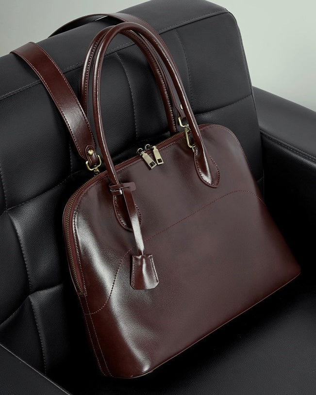 Women's Genuine Leather Dome Satchel with Signature Tassel