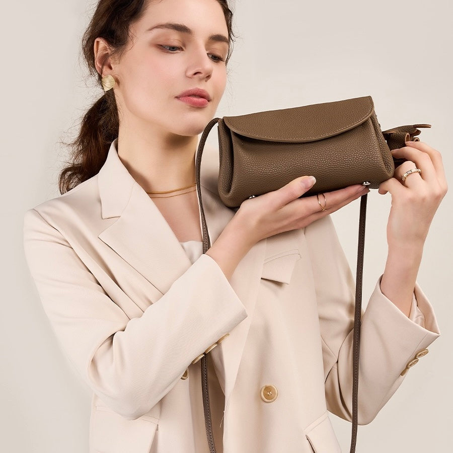 Exquisite Genuine Leather Crossbody Bag with Mini Elephant Pendant