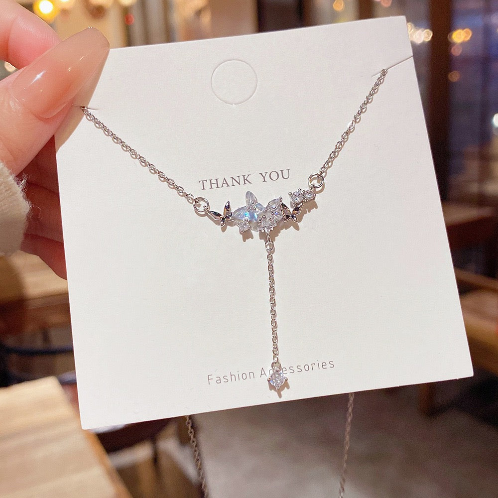 Butterfly Hanging on Stars Necklace