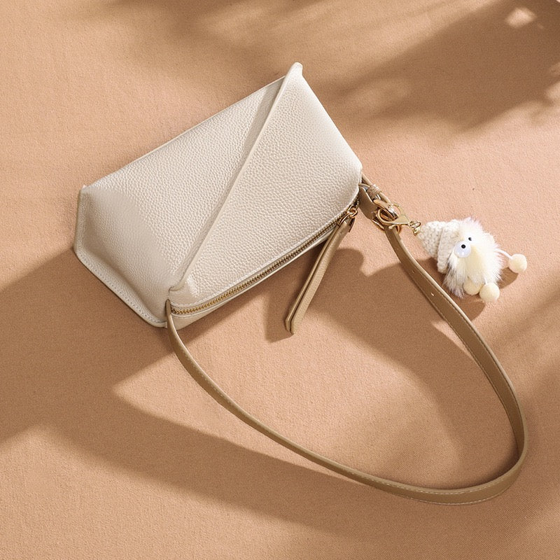 Elegant Geometric Genuine Leather Crossbody Bag with Plush Charm