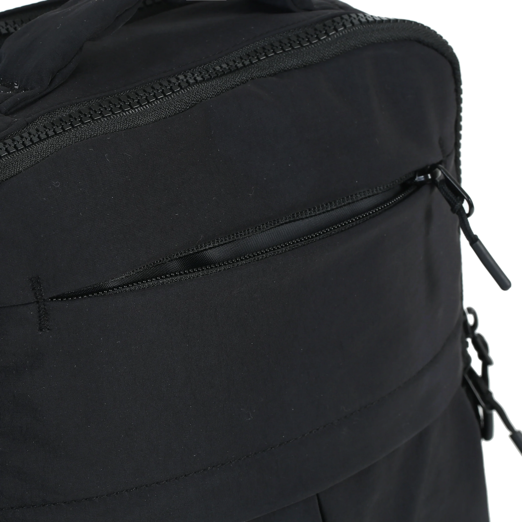 Minimax - The Roomiest Mini Backpack