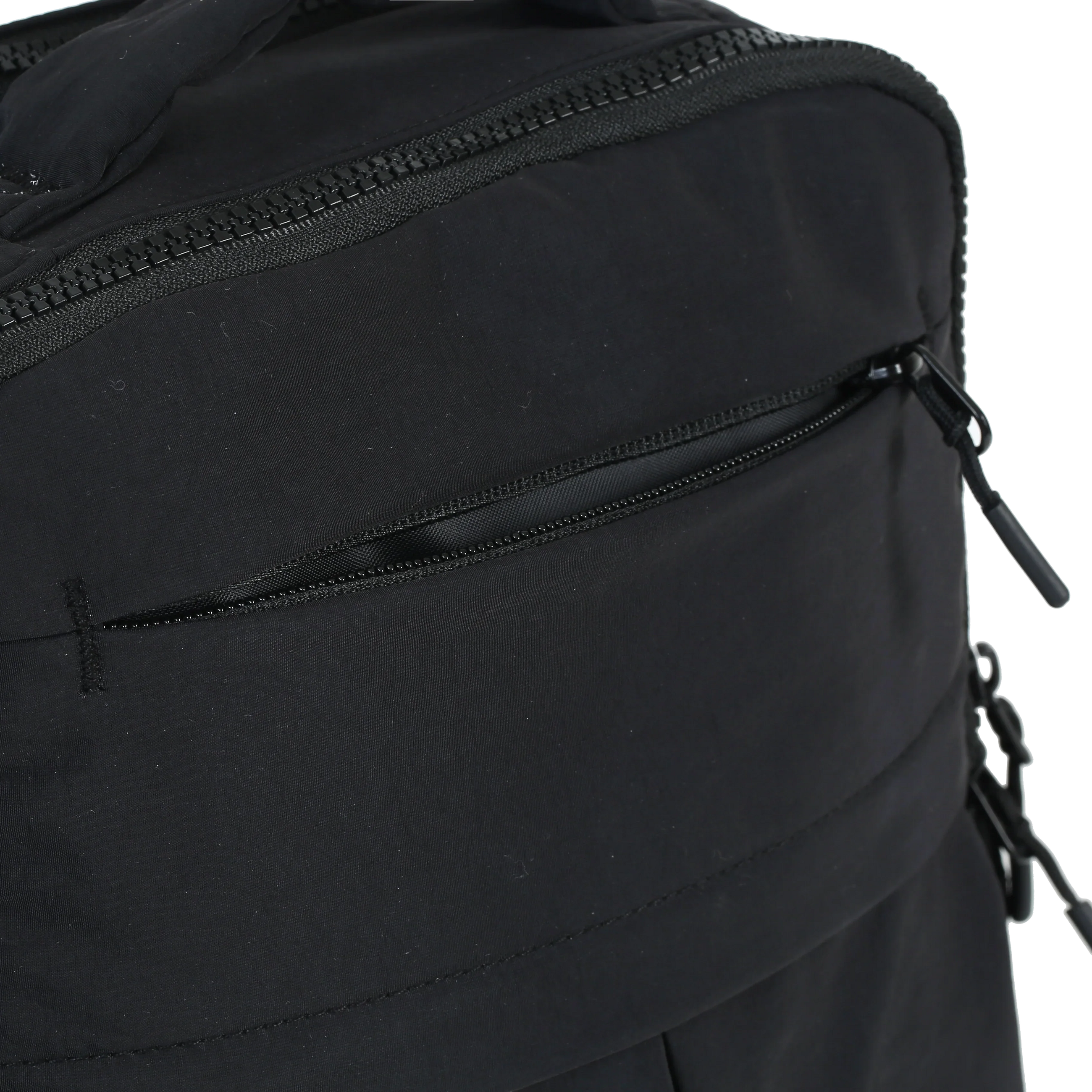 Minimax - The Roomiest Mini Backpack