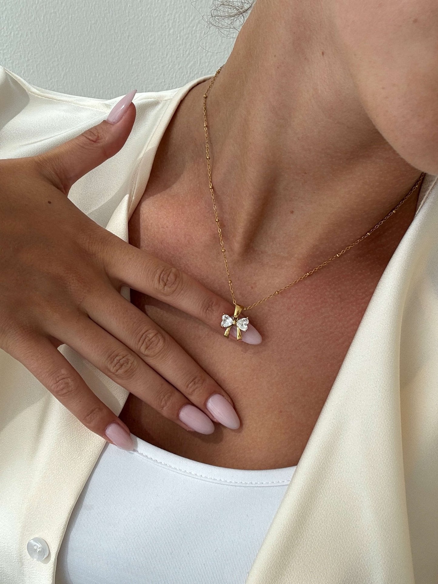 Amara Zirconia Bow Pendant Necklace