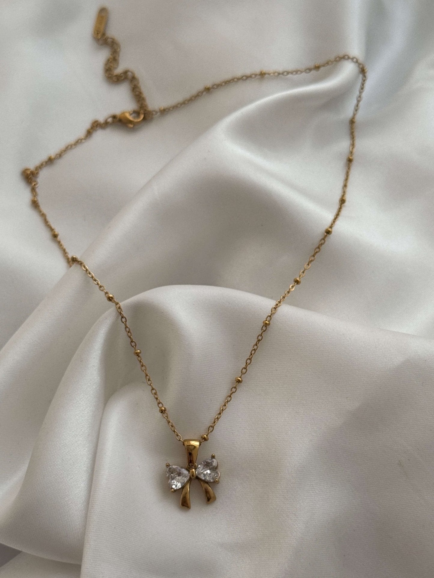 Amara Zirconia Bow Pendant Necklace